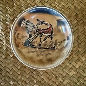 Handcrafted African soapstone trinket bowl featuring a zebra.
